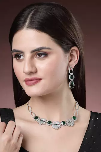 Women green & silver-plated american diamond handcrafted jewellery set