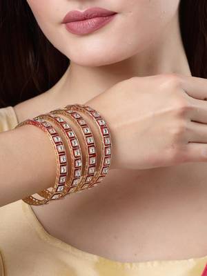 Women set of 4 gold-plated red kundan-studded traditional bangles 1