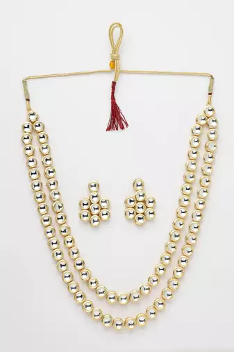 Women rhodium-plated kundan-studded necklace and earrings