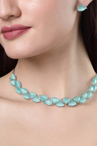 Women green artificial stones studded handcrafted jewellery set