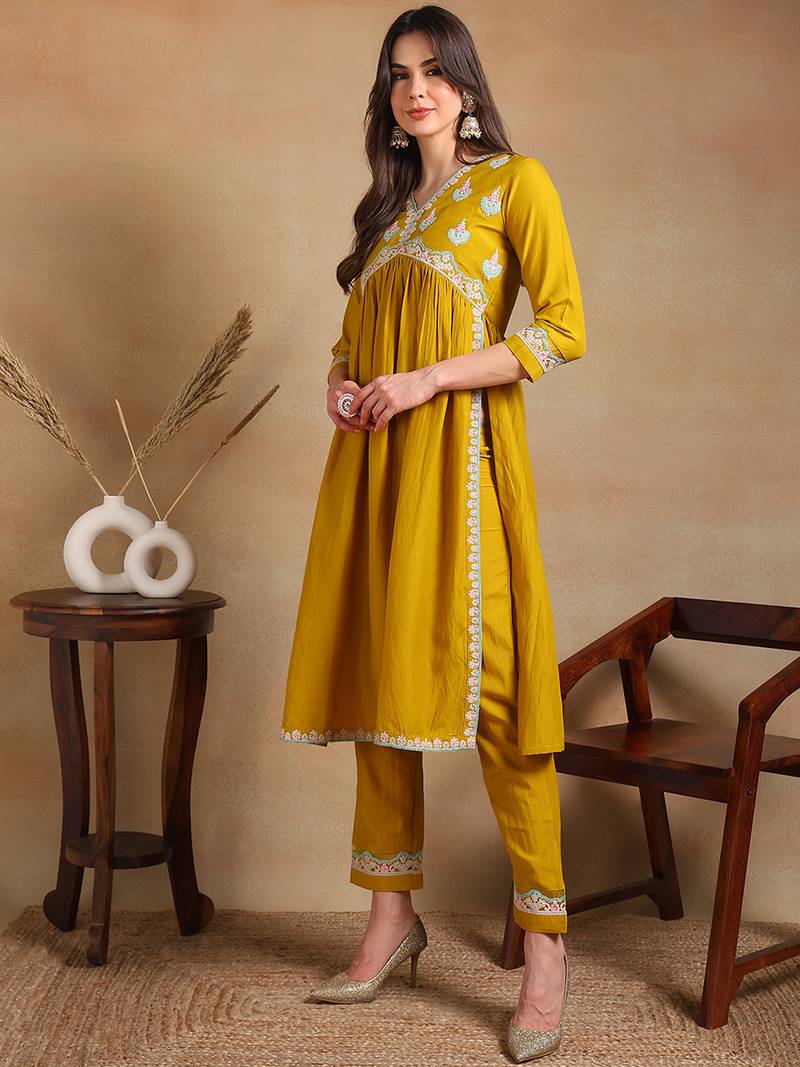 yellow solid silk blend fancy kurta with trouser set