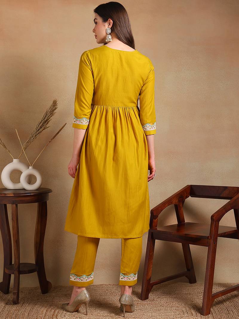 yellow solid silk blend fancy kurta with trouser set
