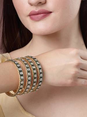 Women set of 4 gold-plated green kundan-studded traditional bangles 1