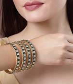 Women set of 4 gold-plated green kundan-studded traditional bangles