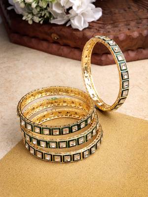 Women set of 4 gold-plated green kundan-studded traditional bangles 2