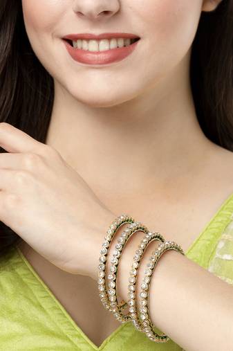 Women set of 4 gold-plated kundan-studded traditional bangles