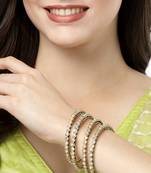 Women set of 4 gold-plated kundan-studded traditional bangles