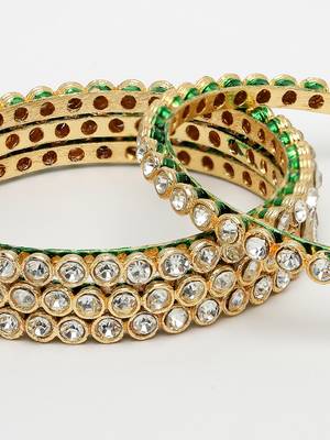 Women set of 4 gold-plated kundan-studded traditional bangles 3