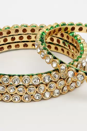 Women set of 4 gold-plated kundan-studded traditional bangles