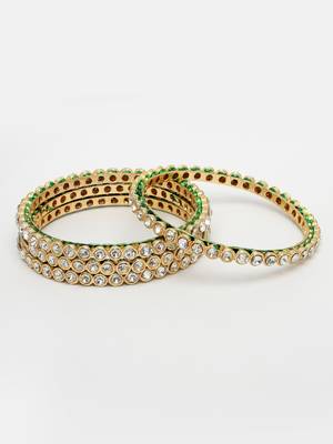 Women set of 4 gold-plated kundan-studded traditional bangles 4