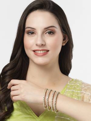 Women set of 4 gold-plated kundan-studded traditional bangles 5