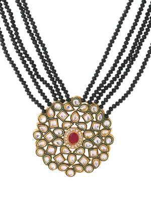Women's gold plated kundan studded jewellery set 4