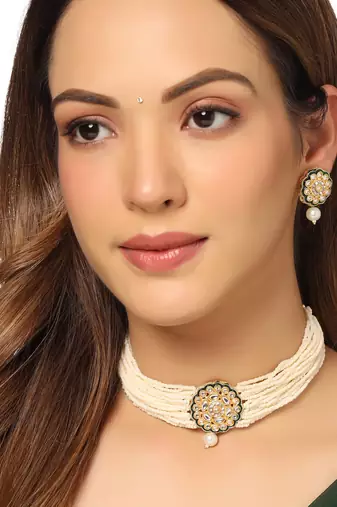 Women gold plated kundan studded jewellery set
