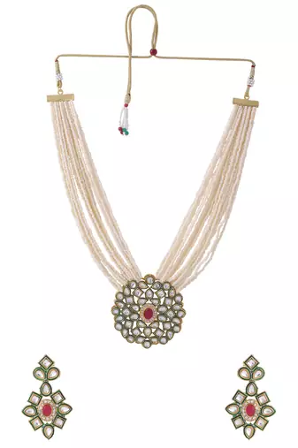 Women gold-plated kundan studded jewellery set