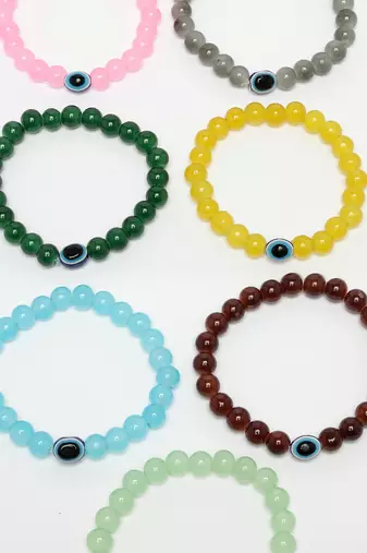 Unisex set of 7 crystals beaded evil eye elasticated bracelet