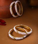 Women set of 2 gold-plated traditional pearls beaded bangles