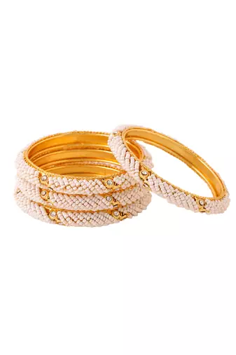 Women set of 2 gold-plated traditional pearls beaded bangles