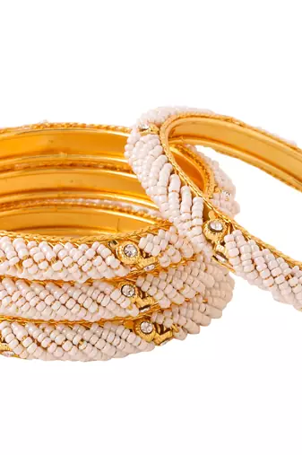 Women set of 2 gold-plated traditional pearls beaded bangles