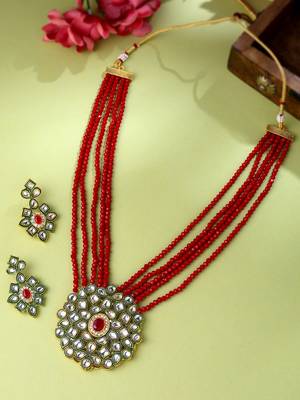 Women gold-plated kundan studded jewellery set 1