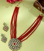 Women gold-plated kundan studded jewellery set