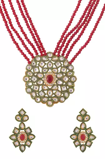 Women gold-plated kundan studded jewellery set