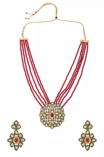 Women gold-plated kundan studded jewellery set