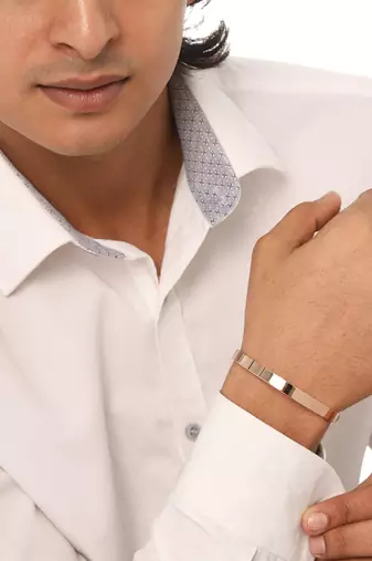 Men's rose gold metal interlock kada bracelet