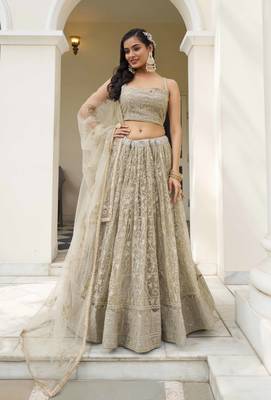 IVORY NET FABRIC LEHENGA CHOLI WITH SEQUINS AND THREAD EMBROIDERY WORK 1