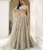 IVORY NET FABRIC LEHENGA CHOLI WITH SEQUINS AND THREAD EMBROIDERY WORK