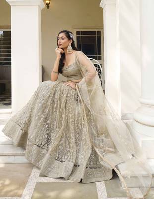 IVORY NET FABRIC LEHENGA CHOLI WITH SEQUINS AND THREAD EMBROIDERY WORK 6