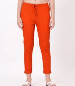 Satrangi women's viscose ribbed lycra rust orange solid slim fit pant