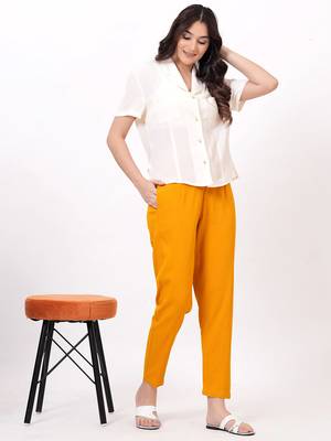 Satrangi women's viscose lycra mustard solid slim fit pant 1