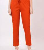Satrangi women's viscose lycra rust solid slim fit pant