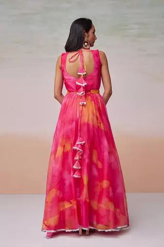 This multi color flared organza dress with dupatta.