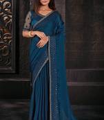 Teal blue coloured sequined zari resham embroidered chiffon silk saree with blouse piece