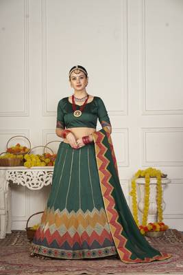 Glamorous Green Colour Classy Embroidered Partywear Ethnic Lehenga 1