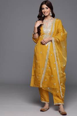 Mustard colour trendy partywear smart embroidered suit for graceful looks 1