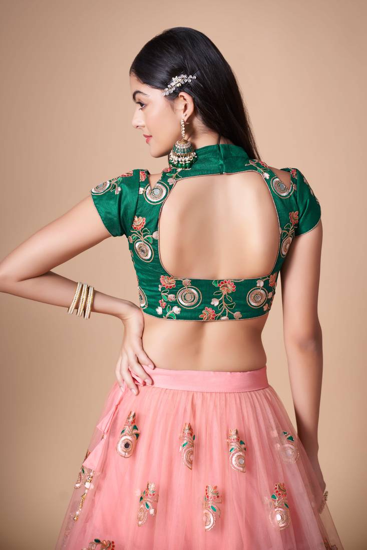 Peach Thread Zari Dori And Sequins Embroidered With Mirror Work Soft Net Lehenga Choli