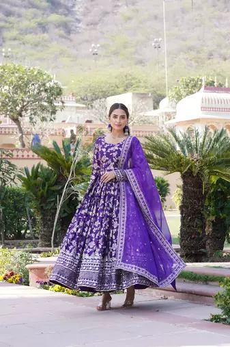 Dazzling smart purple colour heavy gown with dupatta for party looks