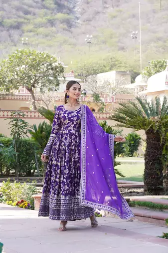 Dazzling smart purple colour heavy gown with dupatta for party looks
