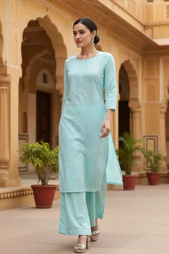 turquoise blue color printed poly crepe fancy kurta with palazzo set