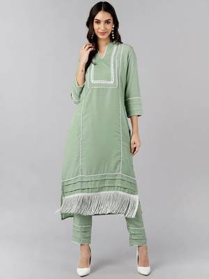 green color solid poly silk fancy kurta with trouser set 1