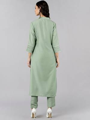 green color solid poly silk fancy kurta with trouser set 4