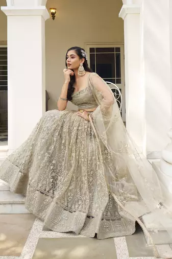  ivory sequins net lehenga set choli with dupatta