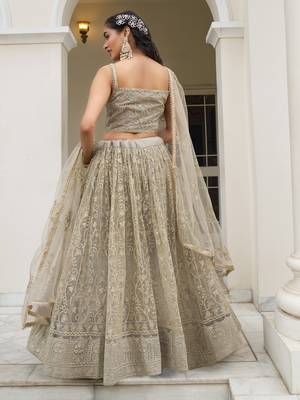 ivory sequins net lehenga set choli with dupatta 3