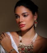 Red & pink adjustable bracelet with kundan & pearls