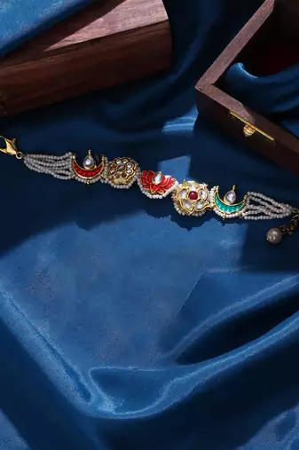 Red & pink adjustable bracelet with kundan & pearls