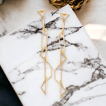 Pretty long matte gold finish earrings for partywear 1