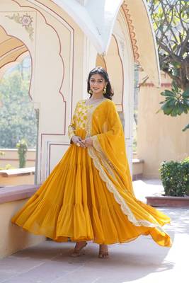 Yellow colour ethnic looking girlish partywear gown with dupatta 3