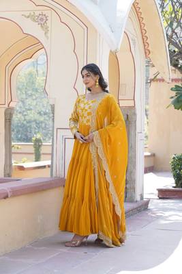 Yellow colour ethnic looking girlish partywear gown with dupatta 5